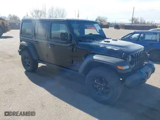 2023 Jeep Wrangler 4xe with VIN 1C4JJXN62PW630844, listed as a IAAI auction lot 41736400 with 42,593 mi miles. Bid and sale history available at carsss.com. Image 1.