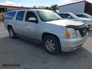2013 GMC Yukon XL SLT with VIN 1GKS1KE01DR311582, listed as a IAAI auction lot 41646991 with 164,789 mi miles. Bid and sale history available at carsss.com. Image 1.