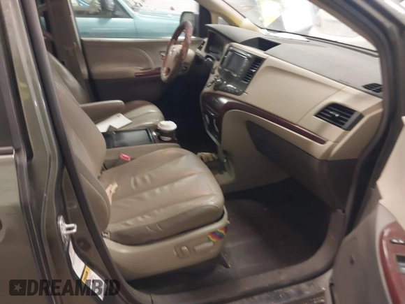 2011 Toyota Sienna XLE with VIN 5TDDK3DC0BS008343, listed as a IAAI auction lot 41444268 with 215,778 mi miles. Bid and sale history available at carsss.com. Image 5.