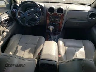 2007 GMC Envoy SLT with VIN 1GKDS13S572158514, listed as a Copart auction lot 74208144 with 209,797 mi miles and Salvage Title. Bid and sale history available at carsss.com. Image 8.