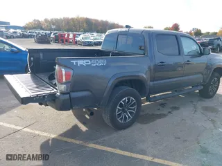 2023 Toyota Tacoma 4WD SR with VIN 3TMCZ5AN8PM574766, listed as a IAAI auction lot 40663003 with 43,978 mi miles. Bid and sale history available at carsss.com. Image 4.
