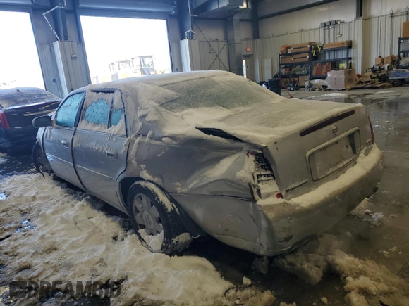 2002 Cadillac DeVille DTS with VIN 1G6KF57912U199809, listed as a Copart auction lot 87372504 with 154,663 mi miles and Salvage Title. Bid and sale history available at carsss.com. Image 2.