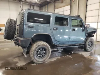 2006 Hummer H2 with VIN 5GRGN23U86H113357, listed as a Copart auction lot 75432754 with 170,799 mi miles and Salvage Title. Bid and sale history available at carsss.com. Image 3.