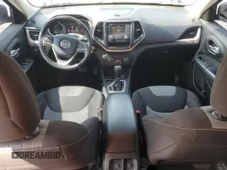 2015 Jeep Cherokee Sport z VIN 1C4PJLAB9FW731898, wystawiony jako Copart lot #55966565 z przebiegiem 114 137 mil mil oraz Szkoda całkowita • Salvage title. Historia ofert i sprzedaży dostępna na DreamBid. Obrazek 8.