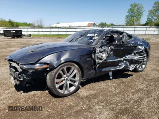 2019 Ford Mustang GT z VIN 1FA6P8CF2K5120723, wystawiony jako Copart lot #57516505 z przebiegiem Nie podano mil oraz Szkody całkowita. Historia ofert i sprzedaży dostępna na DreamBid. Obrazek 1.
