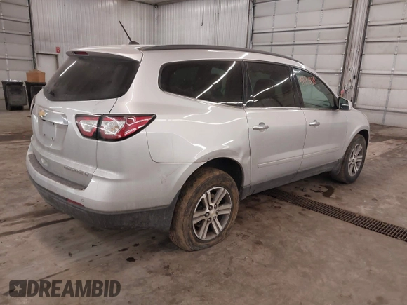 2015 Chevrolet Traverse LT with VIN 1GNKVHKD4FJ305990, listed as a IAAI auction lot 41441938 with 203,877 mi miles and . Bid and sale history available at DreamBid. Image 4.