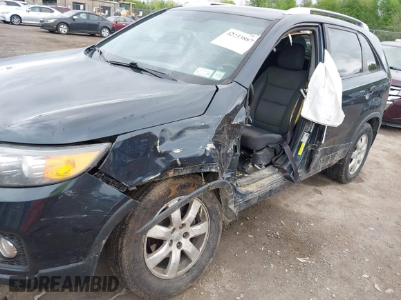 2013 Kia Sorento LX with VIN 5XYKTCA67DG405003, listed as a IAAI auction lot 42253887 with 197,093 mi miles and . Bid and sale history available at DreamBid. Image 6.