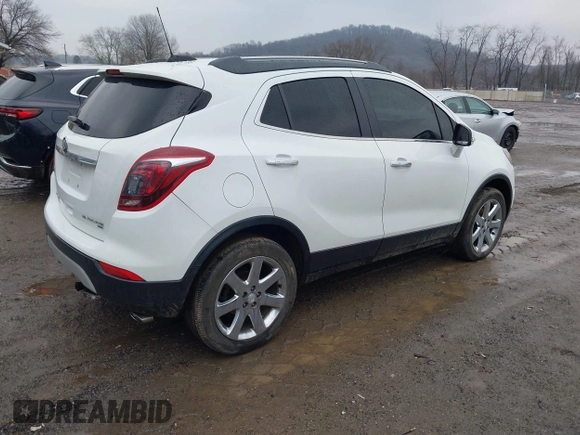 2017 Buick Encore Essence with VIN KL4CJGSB1HB102435, listed as a IAAI auction lot 41660633 with 88,249 mi miles and . Bid and sale history available at DreamBid. Image 4.