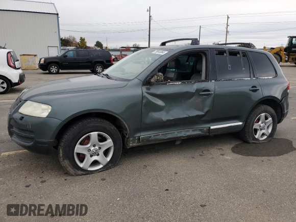2004 Volkswagen Touareg with VIN WVGCM67L04D027410, listed as a Copart auction lot 79044964 with 100,509 mi miles and Salvage title. Bid and sale history available at DreamBid. Image 1.