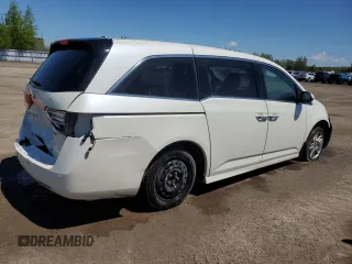2015 Honda Odyssey Touring Elite with VIN 5FNRL5H92FB504977, listed as a Copart auction lot 56657195 with 189,438 mi miles and Salvage title. Bid and sale history available at DreamBid. Image 3.