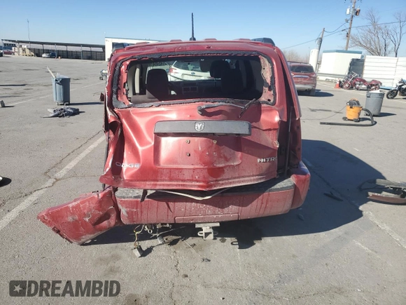 2010 Dodge Nitro SE z VIN 1D4PU2GK5AW119671, wystawiony jako Copart lot #42454185 z przebiegiem 206 764 mil mil oraz Szkoda całkowita • Salvage title. Historia ofert i sprzedaży dostępna na DreamBid. Obrazek 6.