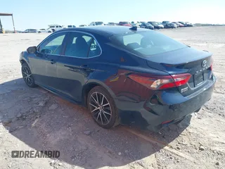 2021 Toyota Camry SE Nightshade with VIN 4T1G11AK5MU404780, listed as a IAAI auction lot 41897739 with 94,320 mi miles and . Bid and sale history available at carsss.com. Image 3.