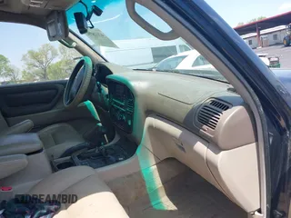 2000 Toyota Land Cruiser with VIN JT3HT05J8Y0123024, listed as a IAAI auction lot 42028792 with 360,074 mi miles. Bid and sale history available at carsss.com. Image 5.