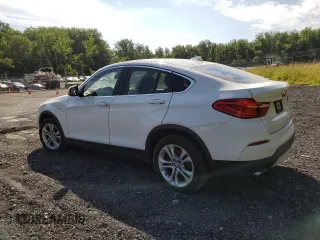 2015 BMW X4 xDrive28i with VIN 5UXXW3C51F0M89005, listed as a Copart auction lot 57392984 with 142,385 mi miles. Bid and sale history available at carsss.com. Image 2.
