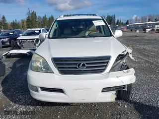 2003 Lexus GX 470 with VIN JTJBT20X330021757, listed as a IAAI auction lot 41695930 with 177,634 mi miles. Bid and sale history available at carsss.com. Image 12.