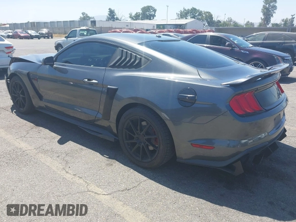 2019 Ford Mustang EcoBoost with VIN 1FA6P8TH5K5181274, listed as a IAAI auction lot 42719275 with 91,605 mi miles and . Bid and sale history available at DreamBid. Image 3.