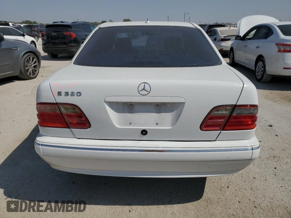2000 Mercedes-Benz E-Class with VIN WDBJF65J5YB054237, listed as a Copart auction lot 76315974 with 95,092 mi miles and Salvage Title. Bid and sale history available at carsss.com. Image 6.