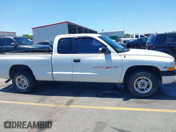 1999 Dodge Dakota SLT z VIN 1B7GL22X0XS193423, wystawiony jako IAAI lot #42053562 z przebiegiem 209 802 mil mil oraz . Historia ofert i sprzedaży dostępna na DreamBid. Obrazek 13.