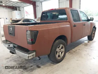 2007 Nissan Titan XE with VIN 1N6BA07A57N233449, listed as a IAAI auction lot 41381833 with 176,720 mi miles. Bid and sale history available at carsss.com. Image 4.
