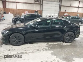 2022 Tesla Model S with VIN 5YJSA1E58NF478403, listed as a IAAI auction lot 41533099 with 42,779 mi miles and . Bid and sale history available at DreamBid. Image 14.