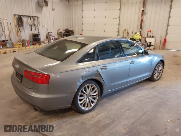 2014 Audi A6 Premium Plus with VIN WAUGFAFCXEN085327, listed as a IAAI auction lot 42094205 with 97,389 mi miles and . Bid and sale history available at DreamBid. Image 4.
