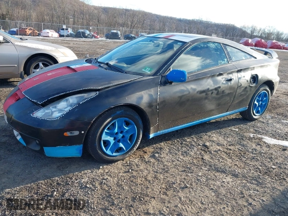 2000 Toyota Celica GT with VIN JTDDR32TXY0061397, listed as a IAAI auction lot 41264249 with 256,280 mi miles. Bid and sale history available at carsss.com. Image 2.