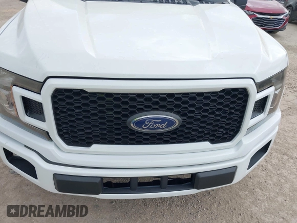 2018 Ford F-150 XL with VIN 1FTEW1C52JKC49228, listed as a IAAI auction lot 42162616 with 148,329 mi miles. Bid and sale history available at carsss.com. Image 12.