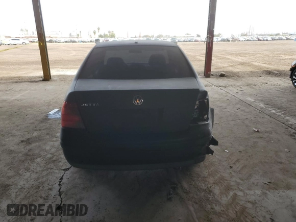 1999 Volkswagen Jetta GL z VIN 3VWRA29M7XM058584, wystawiony jako Copart lot #83714754 z przebiegiem 398 647 mil mil oraz Szkoda całkowita • Salvage title. Historia ofert i sprzedaży dostępna na DreamBid. Obrazek 6.