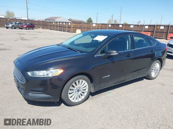 2013 Ford Fusion SE Hybrid with VIN 3FA6P0LUXDR298606, listed as a IAAI auction lot 41976525 with 121,660 mi miles. Bid and sale history available at carsss.com. Image 2.