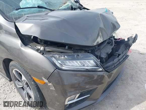 2018 Honda Odyssey Touring with VIN 5FNRL6H83JB008463, listed as a IAAI auction lot 41805044 with 65,001 mi miles. Bid and sale history available at carsss.com. Image 19.