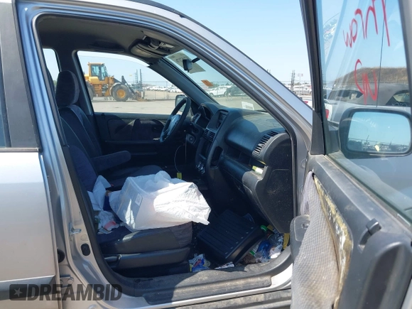 2003 Honda CR-V LX z VIN JHLRD68453C004928, wystawiony jako IAAI lot #42452176 z przebiegiem 258 092 mil mil oraz . Historia ofert i sprzedaży dostępna na DreamBid. Obrazek 5.
