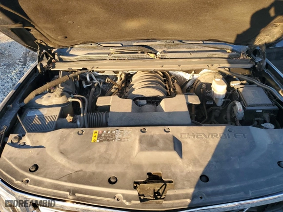 2017 Chevrolet Suburban Premier with VIN 1GNSKJKC5HR303600, listed as a Copart auction lot 83395644 with 124,465 mi miles and Salvage Title. Bid and sale history available at carsss.com. Image 12.