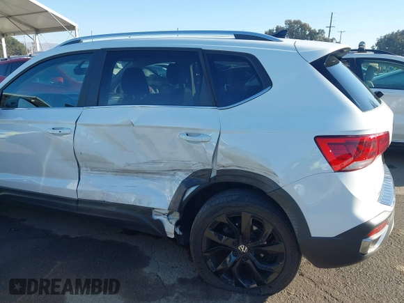 2022 Volkswagen Taos SE z VIN 3VVLX7B20NM097528, wystawiony jako IAAI lot #41152253 z przebiegiem 45 607 mil mil oraz . Historia ofert i sprzedaży dostępna na DreamBid. Obrazek 6.