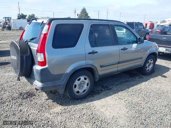 2006 Honda CR-V LX with VIN JHLRD68516C006561, listed as a IAAI auction lot 41855457 with 215,139 mi miles. Bid and sale history available at carsss.com. Image 4.