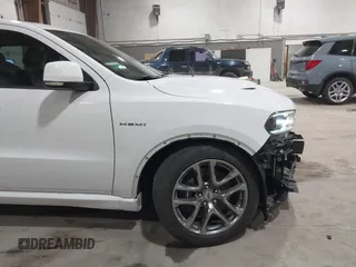 2022 Dodge Durango R/T with VIN 1C4SDJCT3NC156502, listed as a IAAI auction lot 41672093 with 16,853 mi miles and . Bid and sale history available at DreamBid. Image 19.