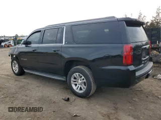 2015 Chevrolet Suburban LT with VIN 1GNSKJKC7FR122155, listed as a Copart auction lot 46984425 with Not Provided miles and Salvage Title. Bid and sale history available at DreamBid. Image 2.