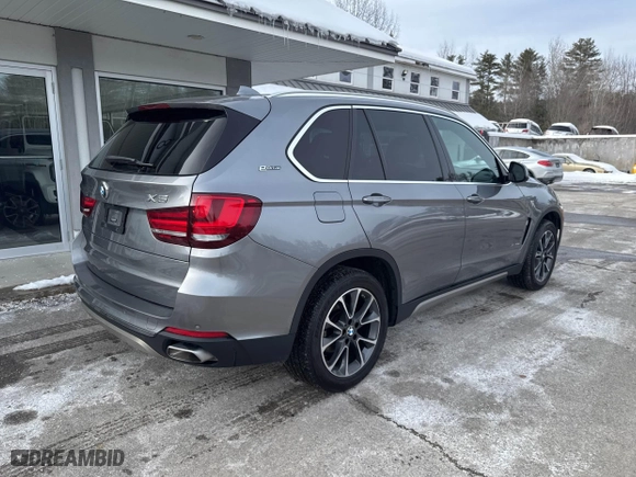 2017 BMW X5 xDrive40e iPerformance with VIN 5UXKT0C37H0V96031, listed as a IAAI auction lot 41643611 with 95,215 mi miles. Bid and sale history available at carsss.com. Image 4.
