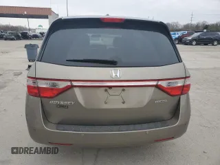 2012 Honda Odyssey Touring with VIN 5FNRL5H9XCB078399, listed as a Copart auction lot 52360165 with 174,819 mi miles and Salvage Title. Bid and sale history available at DreamBid. Image 6.