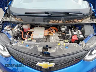 2020 Chevrolet Bolt EV LT z VIN 1G1FW6S0XL4145254, wystawiony jako IAAI lot #42255536 z przebiegiem 16 691 mil mil oraz . Historia ofert i sprzedaży dostępna na DreamBid. Obrazek 10.