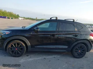 2017 Hyundai Tucson Value with VIN KM8J33A2XHU462806, listed as a IAAI auction lot 42045963 with 102,678 mi miles. Bid and sale history available at carsss.com. Image 14.