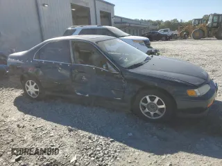 1995 Honda Accord EX with VIN 1HGCD5661SA012246, listed as a Copart auction lot 77007384 with 211,546 mi miles and Salvage Title. Bid and sale history available at DreamBid. Image 4.