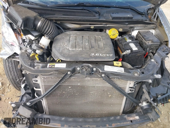 2016 Dodge Grand Caravan SXT with VIN 2C4RDGCG7GR325113, listed as a IAAI auction lot 42045811 with 86,372 mi miles and . Bid and sale history available at DreamBid. Image 10.