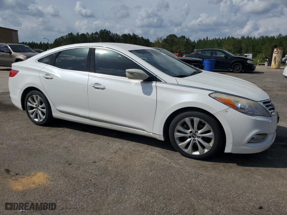 2014 Hyundai Azera with VIN KMHFG4JG0EA352016, listed as a Copart auction lot 51609895 with 186,157 mi miles and Clean Title. Bid and sale history available at carsss.com. Image 4.