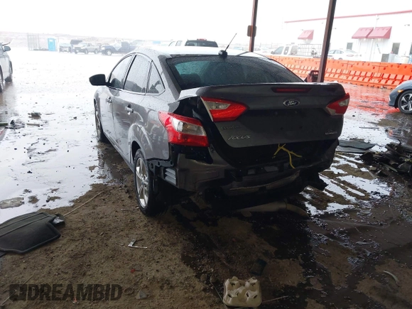 2013 Ford Focus SE with VIN 1FADP3F29DL243937, listed as a IAAI auction lot 42145911 with 90,376 mi miles and . Bid and sale history available at DreamBid. Image 3.