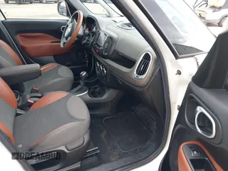 2014 FIAT 500L Trekking with VIN ZFBCFADH1EZ019700, listed as a IAAI auction lot 41869856 with 131,940 mi miles and . Bid and sale history available at DreamBid. Image 5.