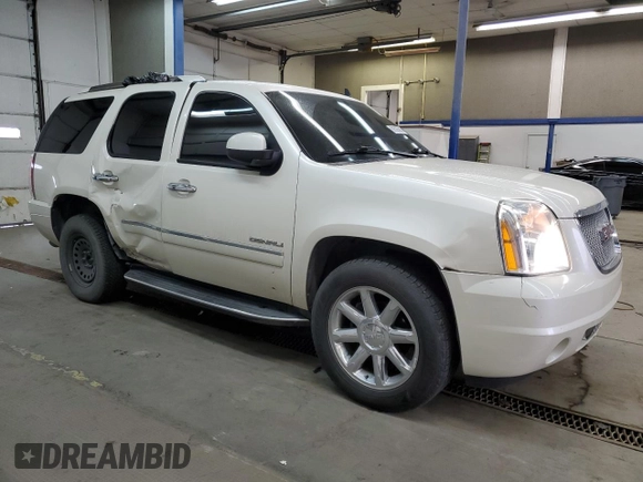 2014 GMC Yukon Denali with VIN 1GKS2EEF6ER141112, listed as a Copart auction lot 88526685 with 142,248 mi miles and Salvage Title. Bid and sale history available at carsss.com. Image 4.