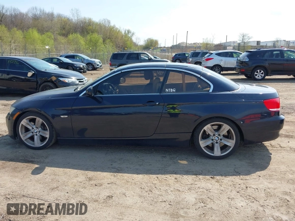 2010 BMW 3 Series 335i with VIN WBAWL7C59AP475993, listed as a IAAI auction lot 42112968 with 101,373 mi miles. Bid and sale history available at carsss.com. Image 14.