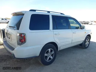 2006 Honda Pilot EX-L with RES with VIN 5FNYF28606B030602, listed as a IAAI auction lot 41392868 with 227,782 mi miles. Bid and sale history available at carsss.com. Image 4.