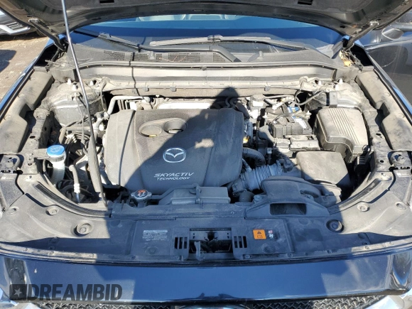 2019 Mazda CX-5 Grand Touring with VIN JM3KFBDM0K0571806, listed as a Copart auction lot 43395105 with 57,768 mi miles and Salvage Title. Bid and sale history available at carsss.com. Image 12.