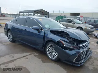2022 Toyota Avalon Hybrid Limited with VIN 4T1DA1AB2NU013574, listed as a IAAI auction lot 41357973 with 24,475 mi miles. Bid and sale history available at carsss.com. Image 1.